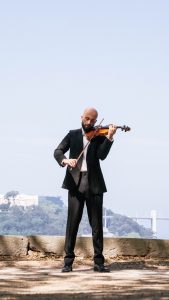 Magical moment: Violinist creating an emotional soundtrack for the marriage proposal